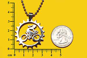 female biker in chain ring pendant